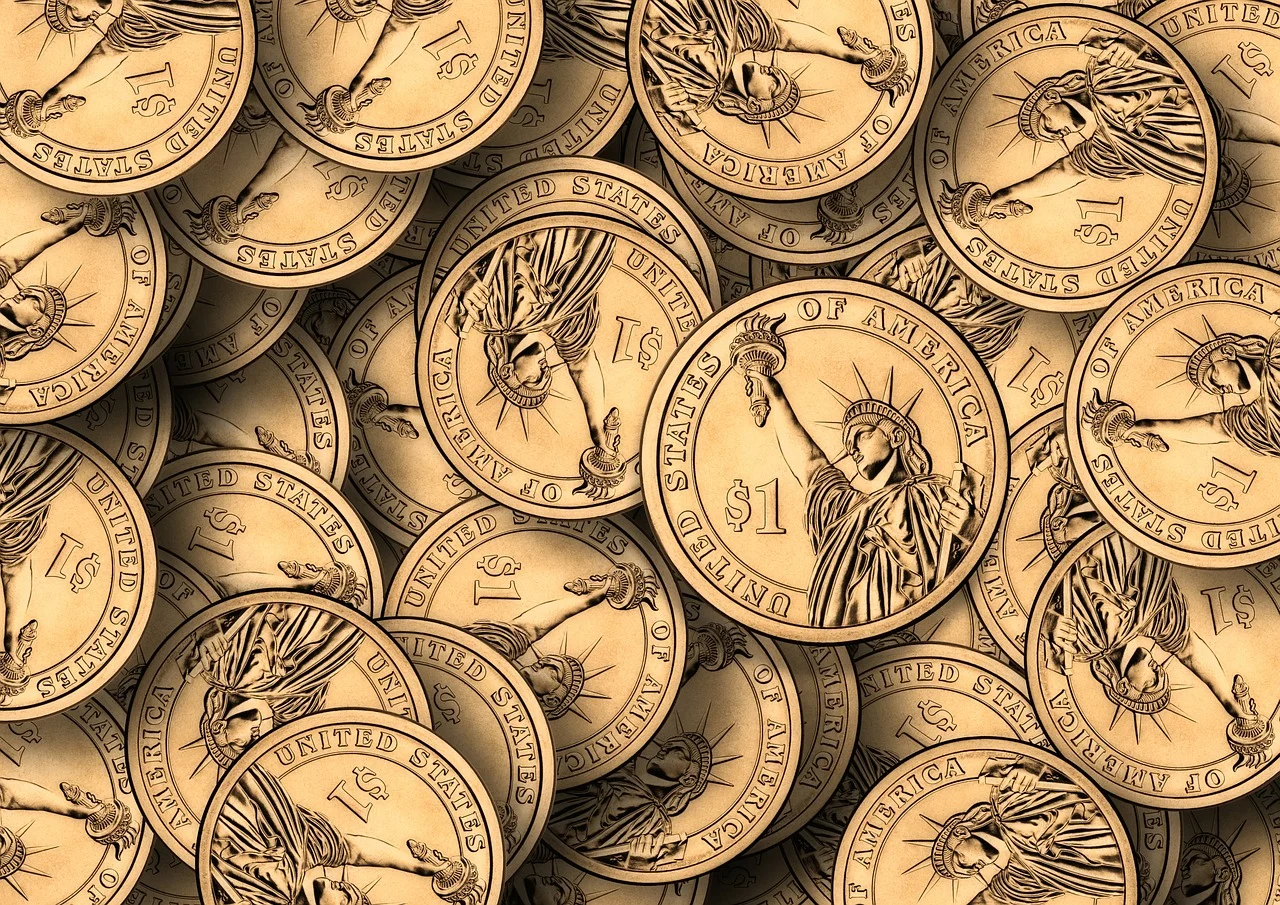 Gold dollar coins representing finance